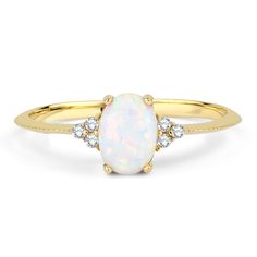 Dainty Opal Ring, Natural White Opal Ring, Stacking Ring, Diamond Ring, 14k Solid Gold Ring, October Birthstone Ring, Oval Cut Opal, Stacking Ring, Solitaire Opal Ring, Promise Ring, Engagement Ring, 14K Solid Gold Natural Oval cut opal stone with both sides 3 real diamonds ring. ITEM DETAILS * Made to Order. * Material: 14K Solid Gold * Material Color Options: Yellow Gold, Rose Gold, White Gold * Band Width: 1.20 MM * Gemstone: Opal * Gemstone Carat: 0.50 CTW * Gemstone Cut: Oval Cut * Side Sto Oval Opal Promise Ring, Oval Opal Ring For Anniversary, Classic Oval Opal Jewelry, Oval Opal Halo Ring In 14k Gold, Heirloom Opal Ring With Diamond In Oval Shape, Heirloom Diamond Opal Ring Oval Shaped, Oval 14k Gold Opal Ring, Heirloom Oval Opal Ring For Anniversary, Heirloom White Opal Ring Oval Cabochon