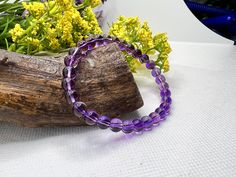 You will love this Amethyst Bracelet Adjustable, each bead is to give you strength whether its for you or someone you love. So consider my natural purple amethyst healing gemstone grade AAAAA 6mm beads bracelets as part of a well-balanced wardrobe. Natural Amethyst Bracelet, Amethyst Gemstone Healing Bracelet, Amethyst Bracelet, Energy Healing BraceletMEASURE YOUR WRIST:- Measure around at the wrist bone in tape or even a strip of paper.- Choose a place where you would normally wear a bracelet. Everyday Purple Amethyst Bracelet, Purple Faceted Amethyst Bracelets, Adjustable Hand-strung Amethyst Beaded Bracelets, Hand-strung Amethyst Beaded Bracelets In Lavender, Adjustable Nickel-free Amethyst Bracelets, Amethyst Healing, Beads Bracelets, Blue Tigers Eye, Amethyst Bracelet