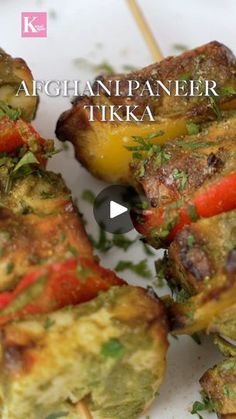 an image of food being served on skewers with the words, afghani paneer tika