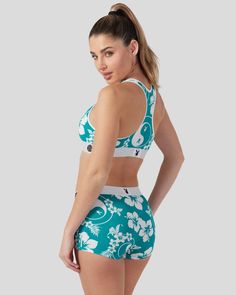 You’ll feel like you're on island time in this new pair from Playboy x PSD. The floral-printed Hawaii Sports Bra is made from a silky poly blend and is breathable yet slightly compressive, bringing you the comfort and support you need for everything you get into. | PSD Women's Playboy - Hawaii Sports Bra, Size Large, Polyester/Blend Sporty Printed Swimwear For Spring, Sporty Spring Printed Swimwear, Sporty Green Activewear For Beach Season, Green Athleisure Activewear For Beach Season, Spring Vacation Sporty Activewear, Sporty Spring Vacation Activewear, Casual Green Sports Bra For Summer, Sporty Fitted Activewear For Vacation, Sporty Sports Bra For Beach Season Vacation