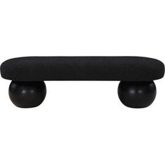 the back end of a black bench with two balls on it's legs and one foot