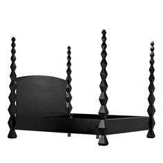 a black bed frame with four posts on each side and a headboard in the middle