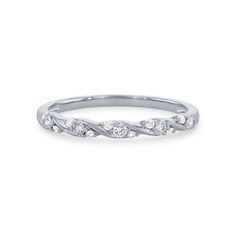 a white gold wedding band with five diamonds