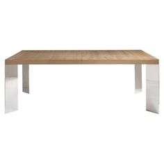 a wooden table with metal legs on a white background