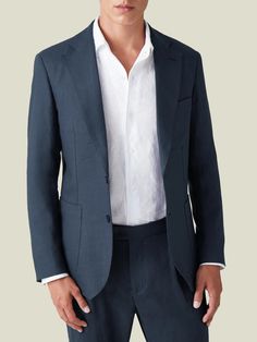 Crafted in Northern Italy from 100% pure linen, treated to obtain a unique natural stretch for breathability and comfort. Designed with a single-breasted 2-button closure, fine sartorial details and a tailored profile for an elegant look.     Cut in a slim yet comfortable fit, this elegant suit jacket has an unstructured profile and is half lined for lightness and a relaxed appeal. Artisanal details like AMF stitching and sartorial details like the notch lapel and patch pockets make this blazer Blue Linen Suit, Navy Blue Linen, Linen Suits, Linen Suit, Men's Suit, Northern Italy, Linen Trousers, Linen Blazer, Trouser Suits