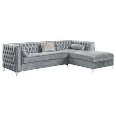 a large gray couch with pillows on it's back and side facing the sofa