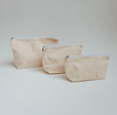 Free Shipping with all orders!  Dimensions of the Bags: SML: 9.25 x 5.5 inches Large: 9.25 x6.5 inches Xlarge: 11.25 x 7 inches Certainly, a canvas zipper pouch is a versatile accessory with a range of potential uses. Here are some practical and creative way to use canvas zipper pouch: - Organizing Makeup: Keep your cosmetics neatly arranged in the pouch, preventing spills and making it easy to find what you need in your purse or travel bag. - Travel Toiletries: Store your travel-sized toiletries like toothpaste, shampoo, and skincare products in the pouch to keep them organized during trips. - Stationery Organizer: Use the pouch to keep your pens, pencils, highlighters, and small notebooks together, whether at school, work, or on the go. - Tech Accessories: Store charging cables, earphone Eco-friendly Rectangular Cosmetic Bag With Zipper, Eco-friendly Rectangular Cosmetic Bag For Daily Use, Cream Rectangular Cosmetic Bag Gift, Canvas Bags With Zipper Pouch For Gifts, Eco-friendly Rectangular Canvas Bag For Personal Use, Eco-friendly Rectangular Canvas Bag, Cream Cosmetic Bag Pouch For Gift, Cream Zipper Pouch As Gift, Canvas Pouch Cosmetic Bag For Gift