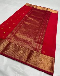 1.this is beautiful pure katan silk chanderi sari with all over buttis with nakshi border with running  blouse piece 2.this sari is 5.5 mt length  3this is a very elegant looking sari for all occasions like weddings and other formal events  4.fall n pico is complimentary  5.blouse can be made as per the requirements of the clients with proper measurements.stiching charges will be extra  6.plz check the availability of the sari before placing the order Red Tissue Silk Traditional Wear With Pallu, Transitional Paithani Silk Saree With Pallu, Paithani Silk Saree With Zari Work For Traditional Ceremonies, Festive Paithani Silk Saree For Puja, Paithani Silk Saree For Puja And Navratri, Navratri Paithani Silk Saree For Traditional Ceremonies, Transitional Paithani Silk Traditional Wear With Zari Weaving, Banarasi Silk Traditional Wear With Zari Weaving For Puja, Red Tissue Silk Dupatta For Puja