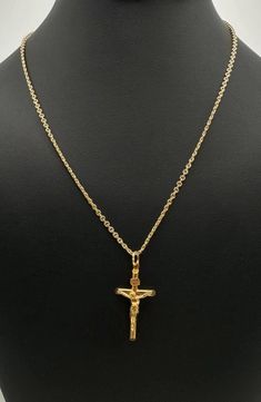 This gorgeous pendant made of 18k solid yellow gold. Total weight: 4.7 grams. Length is 18.5". Width 0.5 mm. Very beautiful and absolutely gorgeous. The unique design of this pendant makes it irresistible. The best choice for you! Perfect gift! ❤️💍🎁 Yellow Gold Plated Crucifix Jewelry, Hallmarked Yellow Gold Crucifix Jewelry, Gold Crucifix Necklace In 14k Gold, Classic Gold Crucifix Necklace, Yellow Gold Crucifix Necklace Gift, 14k Gold Crucifix Necklace For Formal Occasions, Hallmarked Yellow Gold Cross Pendant Necklaces, Gold Cross, Cross Charms