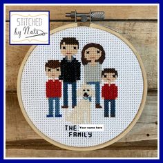 the family cross stitch pattern is hanging on a wall