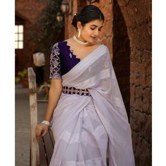 Light Lavender colored saree is made from georgette fabric which is highlighted with zari striped weaving work as shown. comes along with embroidered rangoli silk blouse which you can customise as per your design/style with embroidered belt. Occasion - You can wear this saree for parties, functions and events. Note:- the actual product may differ slightly in color and design from the one illustrated in the images when compared with computer or mobile screen. Measurements: Saree : Georgette : 5.5 Saree Georgette, Plain Saree, Embroidered Belt, Saree Models, Light Lavender, Mobile Screen, Georgette Saree, Georgette Fabric, Lavender Color