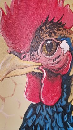 a painting of a rooster with red and blue feathers on it's head is shown