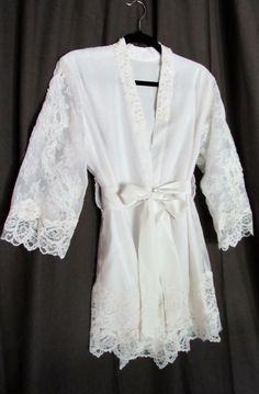 Bridal Robe from Mom's Dress Fitted Lace Wedding Robe, Elegant Lace Wedding Robe, Elegant Mother Of The Bride Gown With Delicate Lace, Satin Wedding Gown With Lace Trim, Elegant Fitted Bride Robe, Cream Lace Trim Wedding Robe, Wedding Night Dress With Lace Bodice, Wedding Gown With Lace Bodice And Satin Material, Satin Wedding Gown With Lace Bodice