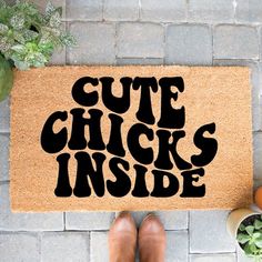 a door mat with the words cute chicks inside on it next to eggs and vegetables