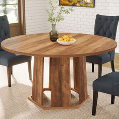 Farmhouse Style - This round dining table features a rustic wood grain finish top and an unique wooden pedestal base, creating a warm and charming farmhouse ambiance. Room for All - Measuring 47.24"L x 47.24"W x 29.53"H, this kitchen table comfortably seats 4-6 people, providing ample tabletop space for meals and tableware. Built to Last - Built with 1.18" thick MDF and a sturdy wooden base, this round table offers endurance and longevity, featuring a scratch-resistant and easy to clean tabletop. Adaptable and Practical - Suited for petite dining spaces or breakfast nooks, this compact table is ideal for family dinners, game nights, or gatherings with friends. Simple Assembly - All essential hardware, tools, and clear instructions are included. Reach out to us with any product-related ques Round Dining Table Farmhouse, Circle Dining Table, Round Conference Table, Compact Table, Wooden Pedestal, Breakfast Nooks, Farmhouse Kitchen Tables, Charming Farmhouse, Wood Pedestal