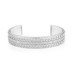 This men's sterling silver and diamond cuff bracelet is an edgy look he'll appreciate. Sterling silver. Features 1/2 ct. t.w. diamonds. Chain edge design adds a stylish touch. 8.0 inches in circumference. Classic Diamond Cut Cuff Bracelet As Gift, Timeless White Gold Cuff Jewelry, Classic Diamond Cut Cuff Bracelet For Gift, Silver Engraved Diamond Bracelet For Anniversary, Engraved Silver Diamond Bracelet For Anniversary, Sterling Silver Cuff Jewelry In White Gold, Timeless White Gold Cuff Bracelet For Anniversary, Classic Formal Cuff Bracelet With Diamond Cut, Luxury Silver Cuff Bracelet With Diamond Accents