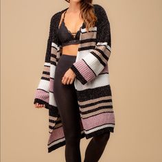 Multiple Stripe Knit Cardigan. Material: 100% Polyester *Model Is Wearing A Small. Pink Knit Cardigan For Casual Wear, Pink One Size Cardigan For Layering, One Size Pink Cardigan For Fall, Pink Knit Cardigan For Layering, Soft Knit Pink Cardigan For Layering, Pink Soft Knit Cardigan For Layering, Trendy Pink Soft Knit Sweater Coat, One Size Pink Knit Sweater, One Size Pink Soft Knit Sweater