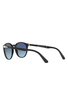 A classic round silhouette with a keyhole bridge defines Italian sunnies finished with signature arrow hardware at the temples. 52mm lens width; 20mm bridge width; 145mm temple length 100% UV protection Prescription-compatible Acetate Made in Italy Black Round Sunglasses, Uv Protection, Round Sunglasses, Sunnies, Temple, Bridge, Nordstrom, Sunglasses, Italy