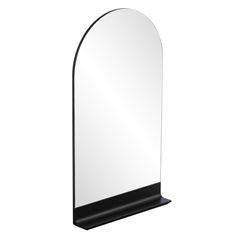 a mirror that is on top of a shelf