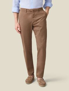 Elevate your spring-summer wardrobe with our whipcord cotton chinos, crafted in Northern Italy from lightweight and durable whipcord cotton. This breathable fabric is blended with 3% elastane for added stretch ensuring a more comfortable and easier fit.    Our chinos feature a mid-rise and slightly tapered fit, designed to provide a refined and sophisticated look. With a focus on practicality, this piece is tailored with four convenient pockets and bespoke details such as a concealed triple butt Cotton Chinos, Northern Italy, Hazelnut, Smart Casual, Summer Wardrobe, Breathable Fabric, Bespoke, Mid Rise, In Italy