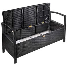 an outdoor wicker bench with storage compartments