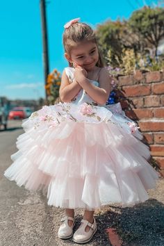 This cute pink flower girl dress features one shoulder neckline, a bodice adorned with delicate embroidery, and a tiered skirt. ♡ Fabric: Tulle ♡ Color: Pink ♡ Length: Tea Length ♡ Time: Processing Time + Shipping Time Processing Time: 12-15 days; Shipping Time: 3-5 days. ♡ If you need this product urgently, or have any questions,please contact our customer service through our live chat or email: contact@modcody.com ♡ Our dresses run true to size. ♡ Besides size 2-14, we still offer free custom Pink Tiered Princess Dress For Spring, Tiered Pink Princess Dress For Spring, Tiered Princess Dress For Wedding, Pink Tulle Ball Gown For First Communion, Pink First Communion Ball Gown Dress, Pink First Communion Ball Gown, Pink Ball Gown For First Communion, Sleeveless Ruffled Tutu Dress For First Communion, Spring Wedding Princess Dress With Tiered Shape