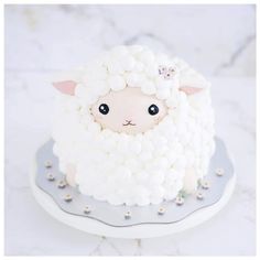 there is a cake that looks like a sheep