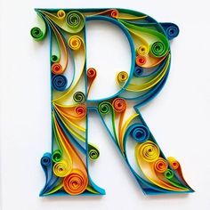 the letter r is made up of colorful spirals