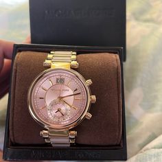 Women's Michael Kors Sawyer Chronograph Pink Watch Mk6360 Ladies Michael Kors Watch Collection. Gold Tone Steel Case. Gold And Rose Acetate Link Bracelet. Chronograph Feature. Date Display. Pink Tone Dial. Case Size: 39 Mm. Scratch Resistant: Mineral Crystal. Water Resistant: 100 Meters /330 Feet. Movement: Quartz. Comes With Original Box. Worn A Handful Of Times I Have Small Wrists So It Looks Very Big On Me. Offers Are Welcome Elegant Pink Watch With Date Display, Pink Chronograph Watch For Formal Occasions, Pink Chronograph Watch As Gift, Pink Watch With Subdials As Gift, Pink Chronograph Watch For Gift, Pink Watches With Subdials As A Gift, Classic Pink Watch With Round Dial, Luxury Pink Watches With Subdials, Pink Watches With Diamond Hour Markers