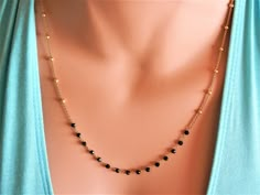 delicate rose gold choker necklace gold chain necklace dainty gold choker gold chain choker black necklace spinel rosary satellite necklace This is a gorgeous necklace that can be worn everyday or on special occasions! This necklace has two parts: the satellite chain necklace part and the black spinel rosary bar /part. This chain rosary necklace is available in gold and rose gold finish! Black spinel stones are tiny and faceted which give a sparkling touch to your look! A beautiful satellite and Rose Gold Jwelery, Dainty Rose Gold Jewelry With Tiny Beads, Elegant Rose Gold Jewelry With Tiny Beads, Delicate Black Necklace For Gift, Delicate Rose Gold Jewelry With Beaded Chain, Black Wire Wrapped Choker Jewelry, Black Choker Necklace With Delicate Chain, Dainty Clavicle Chain With Round Beads Jewelry, Dainty Rose Gold Jewelry With Beaded Chain