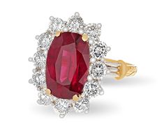 The cushion-cut ruby in this classic ring boasts 5.82 carats and a stunning crimson hue. The gemstone dazzles in its classic 18K yellow gold with a halo of white diamonds totaling approximately 2.50 carats. Download the Certification Unique Ring Designs, Necklaces Diamond, Unusual Facts, Designer Rings, Cushion Cut Ring, Jewelry For Sale, Cushion Ring, Ruby Jewelry, Classic Ring