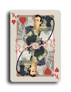 a playing card with an image of two men in the middle and one man holding his head