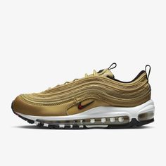 Style No. DQ9131-700 Color: Metallic Gold/Black/White/Varsity Red Push your style full speed ahead with the Air Max 97. Its iconic design takes inspiration from water droplets and Japanese bullet trains. Full-length Nike Air cushioning lets you ride in performance comfort. Lace up and ride first class. Nike Air Max 97 Women's Shoes. Nike Air Max 97 Women, Air Vapormax Plus, Nike Air Vapormax Plus, Nike Model, Nike Models, Nike Air Max For Women, Air Max Women, Nike Air Vapormax, Water Droplets