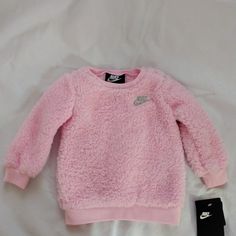 Supremely Plush High-Pile Fleece Means Never-Ending Comfort In A Wintry-Day Set That Includes A Crewneck Sweatshirt. Made In Vietnam Color Pink Size 6m 100%Polyester No Pant Included Tops Nike, Pink Sparkle, Nike Pink, Fleece Sweatshirt, Nike Shirts, Kids Shirts, Crewneck Sweatshirt, Sweater Top, Shirts Tops