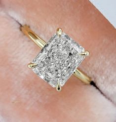 2.5 CT Hybrid Crushed Ice Radiant Cut Ring/Radiant Moissanite Ring/Hidden Halo Ring/14k Solid Yellow Gold Engagement Ring/Anniversary Gifts ❤ ITEM DETAILS:- ✦ Brand: The American Gold House (TAGH) ✦ Handmade, high-quality item! ✦ Material: Solid 10K/14K/18K Gold, 950 Platinum and 925 Sterling Silver ✦ Diamond Type: Moissanite Diamond ✦ Diamond Cut: 9x7 MM Crushed Ice Hybrid Radiant ✦ Diamond Weight: 2.50 CT ✦ Main Stone Color: Colorless ✦ Width of Band: 1.8 MM (Bottom) ✦ Diamond Clarity: VVS/VS ❤ ACCENT/HALO DIAMONDS:- ✦ Side Stone Material: Moissanite Diamond ✦ Side Stone Shape: Round Cut ✦ Side Stone Carat Weight: 0.22 CT  ✦ Side Stone Color: Colorless ✦ Diamond Clarity: VVS/VS ------------------------------------------------------------------------------ 💎 Moissanite VS Diamond 💎 ---- Radiant Cut Ring, Gold House, Radiant Moissanite, Radiant Cut Rings, Hidden Halo Ring, Moissanite Vs Diamond, Ring Hidden Halo, Yellow Gold Engagement Ring, Solid Gold Ring