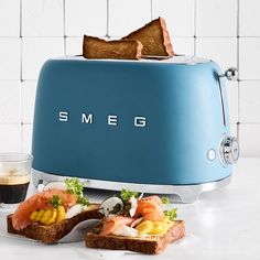 a toaster that has some food on it