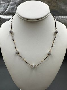 Single-line black diamond bead chain with CZ stone balls Handmade Jewelry  Silver-plated jewelry One gram of gold jewelry  For more products please visit  Globusfashions.com Official Website globusfashions.com 🌸 S H O P . M O R E . S T Y L E S  🌸 https://www.etsy.com/shop/Globusfashions Necklaces -  https://www.etsy.com/shop/Globusfashions?section_id=18712263 Bracelets - https://www.etsy.com/shop/Globusfashions?section_id=18969767 Pendant Sets - https://www.etsy.com/shop/Globusfashions?section Silver Necklaces With Round Beads For Celebration, Party Jewelry With Beaded Chain And Round Beads, Silver Round Beads Necklaces For Celebration, Black Beaded Pearl Chain Necklace As Gift, Black Pearl Chain Necklace As Gift, Black Beaded Necklaces With Pearl Chain For Gift, Black Beaded Necklace With Pearl Chain For Gift, Black Pearl Chain Necklace Gift, Black Beaded Pearl Chain Necklace For Gift