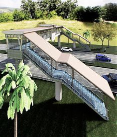 an artist's rendering of a pedestrian bridge over a parking lot with cars on it