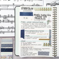 an open notebook with music notes on it