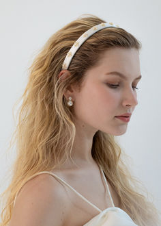 An elegant finishing touch, the Mare Headband features tonal pearl embellishment on lustrous silk satin, for a subtle statement. Crafted by hand in New York, each pearl cluster is brilliantly arranged in the perfect balance of scale. It is designed to comfortably mold to the head for hours of effortless wear. Headband Collection, Julia Berolzheimer, Jennifer Behr, Pearl Cluster, Blue Bridesmaids, Bridal Shop, Fine Jewelry Gift, Bridal Accessories, Silk Satin