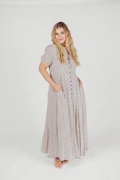 Mariah Collared Button-Down Maxi Dress in Creme Floral - Nursing Frien – Style Cove Flowy Short Sleeve Maxi Dress With Buttons, Flowy Maxi Dress With Buttons And Short Sleeves, Flowy Buttoned Dress For Garden Party, Feminine Dresses With Buttons For Garden Party, Feminine Buttoned Midi Dress For Garden Party, Feminine Midi Dress With Buttons For Garden Party, Cottagecore Dresses With Buttons For Garden Party, Short Sleeve Dresses With Button Closure For Garden Party, Feminine Collared Dresses With Buttons