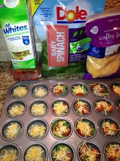 the muffin tins are filled with cheese and ready to go into the oven