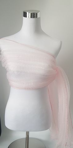 Baby Pink Shawl in organza silk material. To achieve the crinkled / crushed look the shawl is twisted whilst wet and tied with a rope and left to dry. Beautiful shawl, will make any outfit look glamorous.  Keep it or gift it.  Care Instructions Hand wash mild detergent Hang to dry naturally  Crush will remain as long as you don't iron. If you want to remove the crush affect on shawl just iron with cloth on top.  Plz note, once ironed the crush effect will not return. Thank you  Size is approxima Fitted Pink Organza Tulle Fabric, The Crush, Pink Shawl, Pink Wrap, Pink Scarf, Bridal Shawl, Pink Scarves, Wedding Wraps, Net Fabric