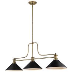 three light chandelier in an antique brass finish with black and white shade shades