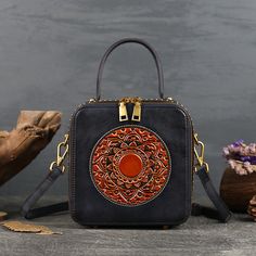 This is a small leather handbags for women with floral totem design. ideal choice as gifts. Features: 100% full grain leather Size: 7.3" x 3.7" x 7.3" Handle length 3.9 inch About 1.84 Ibs Floral totem design in front Two side zipper pockets for daily essentials Durable leather handle Protective feet on bottom Adjustable leather shoulder strap Small Leather Handbags, Small Handbags For Women, Totem Design, Leather Bag Women, Crossbody Tote, Daily Essentials, Small Handbags, Personalized Accessories, Handbags For Women