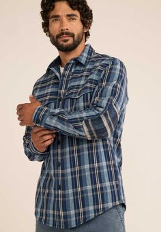 A new Western-style men's shirt crafted from our USA-woven virgin wool fabric, with unique style details. In this design, slightly peaked front yokes button through to close the two chest pockets, while self-fabric elbow patches are the reverse side of the plaid. Soft cotton corduroy lines the neck, yoke and cuffs. Shirttail hem with slightly longer back tail. 100% pure virgin wool; cotton trim. Fabric woven in our American mills. Imported of USA fabric. | MEN'S PLAID WESTON PAWPINE SHIRT Casual Wool Flannel Button-up Shirt, Casual Wool Flannel Shirt With Pockets, Casual Wool Shirt With Pockets, Wool Long Sleeve Flannel Shirt With Button Closure, Wool Button-up Shirt With Pockets, Short Gloves, Wool Shirt, Mens Plaid, Plaid Design