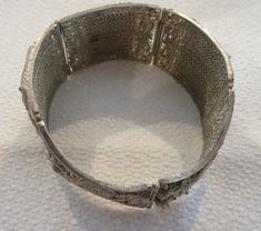 "Estate Sale. Up for auction is a pre-owned vintage bracelet, very detailed handcrafted, diameter inside measure 2.25\" . see detail pictures, I believed it was made in 1950' or earlier. Excellent condition. Comes from pet free smoke free home." Handmade Vintage Cuff Bracelet For Formal Occasions, Antique Cuff Bracelet With Intricate Design For Formal Occasions, Vintage Cuff Bracelet With Intricate Design For Formal Events, Vintage Cuff Bracelet With Intricate Design For Formal Occasions, Vintage Handmade Cuff Bracelet For Formal Occasions, Handmade Vintage Cuff Bracelet For Formal Events, Ornate Hinged Bracelets For Wedding, Vintage Wedding Bangle, Vintage Metal Bangle For Wedding