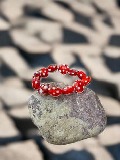 Description Bling your wrist with this bracelet. This bracelet features red beads with a dot pattern in white. Details Bracelet Size:Length:(approx) 7 inches (Elastic) glass beads-Red with White Dots Features One of a kind, fashion jewelry, everyday jewelry Great gift for that special girl, anniversary gift, birthday gift or gift to say how much you care. Check out the rest of our store for other great products!Fast Shipping Satisfaction Guaranteed Your source for great products shipped in a pin Cheap Red Beaded Bracelets For Festivals, Affordable Red Beaded Bracelets For Festivals, Casual Stretch Bracelet For Valentine's Day, Cheap Red Beaded Bracelets With Tiny Beads, Cheap Red Heart-shaped Beaded Bracelets, Stretchy Beaded Bracelet Red Instead, Cheap Red Bracelets With Colorful Beads, Jewelry Everyday, White Details