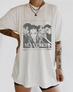 Vintage Maneskin Tour 2023 Shirt, Maneskin T-shirt, Rock Band Tee Band Tshirts Aesthetic, White Rock Style Top For Concerts, Band Merch T-shirt With Graphic Print, Alternative Band Logo Tops For Music Festivals, Alternative Tops With Band Logo For Music Festivals, Alternative Style Tops With Band Logo For Music Festivals, White Crew Neck Rock Style Tops, Alternative Pre-shrunk T-shirt For Summer, Alternative Style Graphic Print T-shirt For Summer