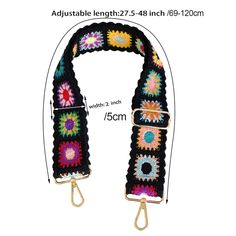 a black crocheted scarf with multicolored flowers on it, and the length is